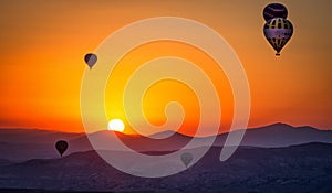 Hot air balloons at sunrise in cappadoccia