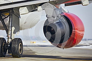 Hot air behind jet engine of plane at airport