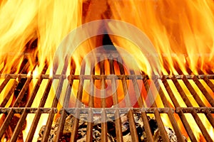 Hot BBQ Grill and Burning Charcoals with Bright Flame