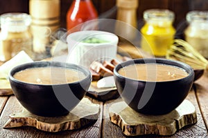 Hot bean broth or soup, winter food with smoke and steam, ingredient around