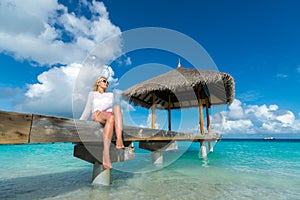 Hot beautiful woman enjoying looking view of beach