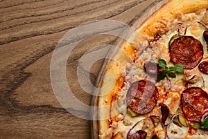 Hot big pepperoni pizza tasty pizza composition with melting cheese bacon tomatoes ham paprika steam smoke