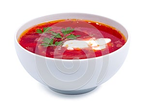 Hot borsch in a white bowl isolated on a white