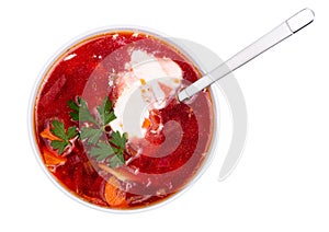 Hot borsch in a white bowl isolated on a white