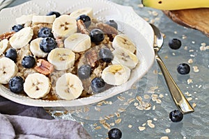 Hot Bowl of Oatmeal Bananas and Blueberries