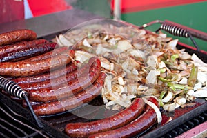 Hot Brats on the BBQ Grill