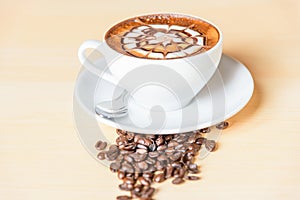 Hot cappuccino with coffee bean