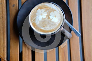 Hot cappuccino latte mocha coffee on wood table