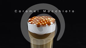 Hot caramel macchiato coffee isolated with black background.