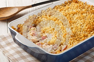 Hot Chicken Cordon Bleu Casserole has layers of chicken, ham, cheese sauce, and buttery Panko breadcrumbs close up in the baking