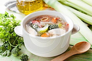 Hot chicken soup with vegetables