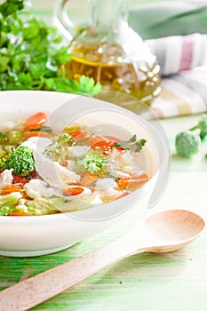 Hot chicken soup with vegetables