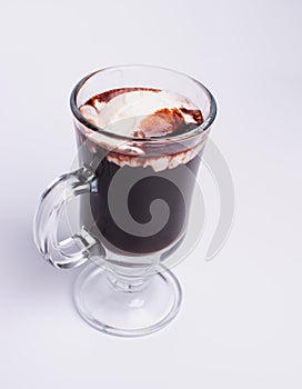 Hot chocolate and chocolate pieces isolated on white background