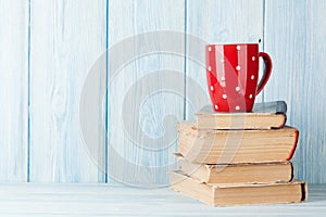 Hot chocolate cup on books