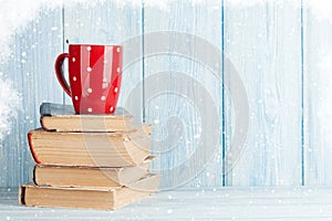 Hot chocolate cup on books