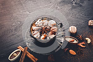 Hot chocolate with marshmallou, nuts, spices, chocolate konfeti, cinnamon.