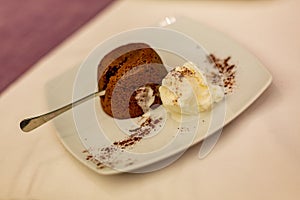 Hot chocolate souffle cake with cream photo