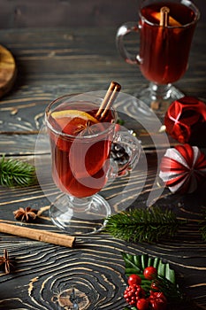 Hot Christmas drink. Mulled wine with orange and cinnamon