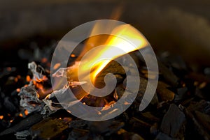 Hot coals with flame photo