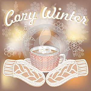 Hot cocoa cup and knitted mittens on blurred background with glitters