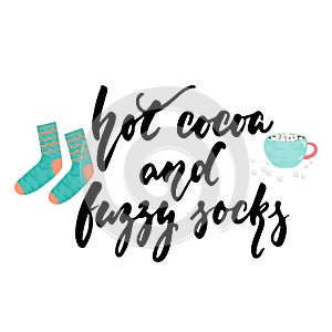 Hot cocoa and fuzzy socks - hand drawn cozy Autumn and Winter lettering and Hugge doodles with cup, marshmallow and warm socks iso photo