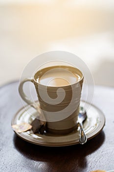 Hot coffe on the table in the morning