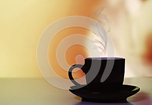 Hot coffe on warm background