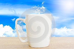 Hot coffee on bright blue, blue and white clouds