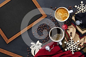 Hot coffee and christmas and happy new year day greeting wooden frame on black table background