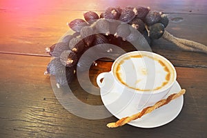 Hot coffee with decoration and filtered image