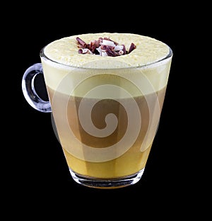 Hot coffee drinks on a black background. Latte with milk and colorful additives