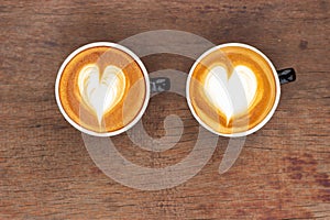 Hot coffee with latte art. Favorite caffeine beverage. Refreshment drink in morning