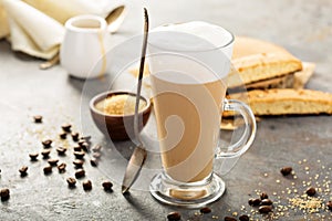 Hot coffee latte with biscotti cookies