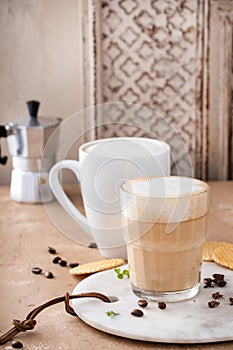 Hot coffee latte and cappuchino in a glass and mug