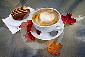 Hot Coffee Latte with Dessert on a Cool Autumn Day