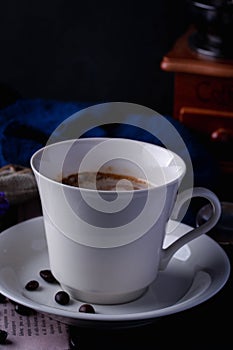 Hot coffee in white ceramic mug