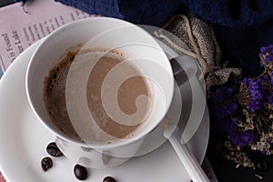 Hot coffee in white ceramic mug