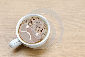 hot coffee in a white Coffee cup on wooden table.