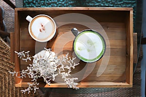 hot cofffee, cappuccino coffee or latte coffee and hot green tea or hot matcha green tea latte and caspia flower