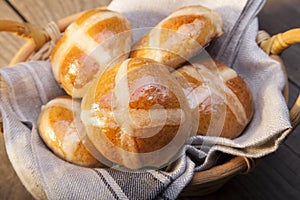 Hot cross buns on basket Top view, copy space. Easter baking