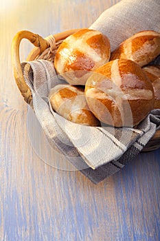 Hot cross buns on basket Top view, copy space. Easter baking