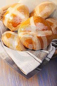 Hot cross buns on basket Top view, copy space. Easter baking