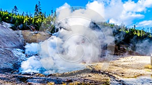 Hot and Crystal Clear Blue Water in the Beryl Spring Geyser in Yellowstone National Park in Wyoming, USA