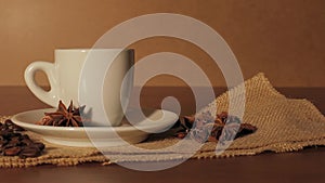 Hot cup of coffee on wooden table