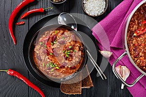 Chili con carne in black bowl