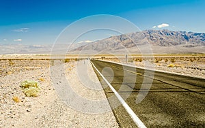 Hot desert road in Death Valley National Park, USA