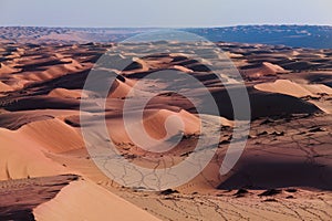 Hot desert scenery. Blue horizon in the desert