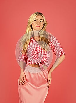Hot desirable blonde. Playful lady on red background. Pin up mood. Sexy woman wear pin up clothes set. Attractive blonde photo