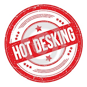 HOT DESKING text on red round grungy stamp