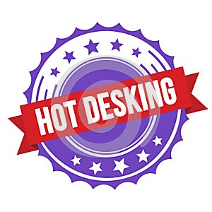 HOT DESKING text on red violet ribbon stamp photo